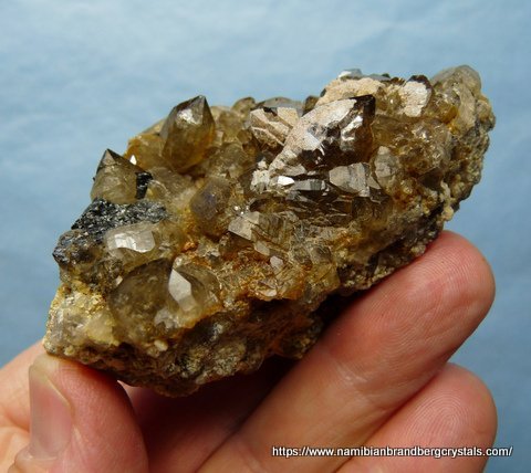 Light smoky quartz crystals on matrix