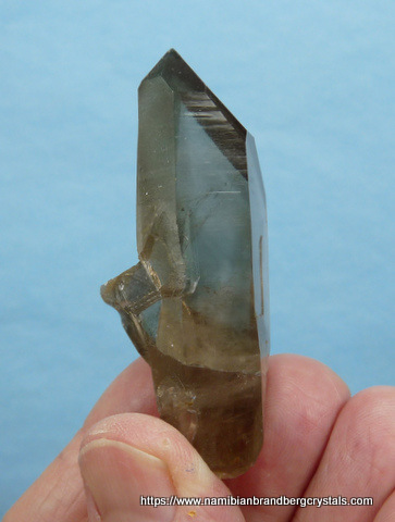 Smoky quartz crystal with a most unusual termination facet
