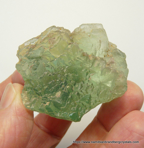 A piece of green fluorite with interesting faces