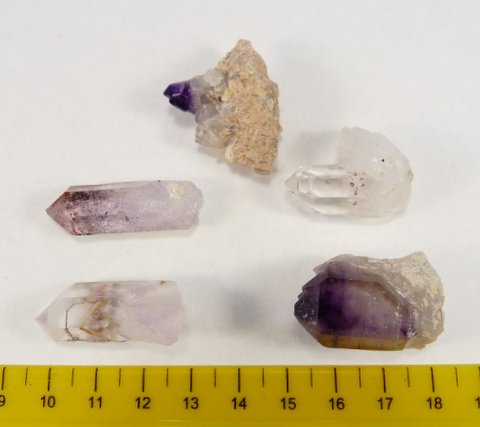Brandberg quartz specimens in bulk, including amethyst