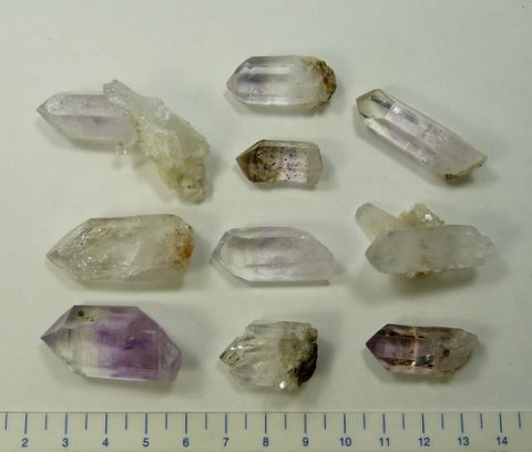 Ten medium to high quality Brandberg quartz crystal specimens