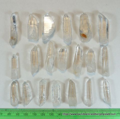 20 medium to high quality clear quartz crystals