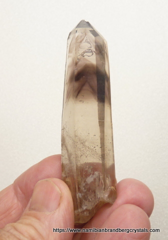 Light smoky quartz crystal with smoky phantom