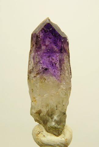 Quartz crystal with upper half dark amethyst