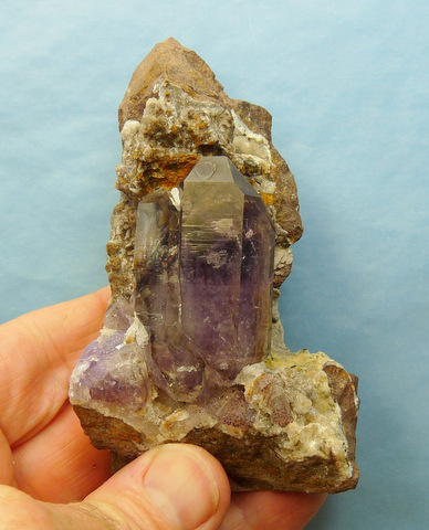 Two double terminated amethyst / smoky quartz crystals on matrix