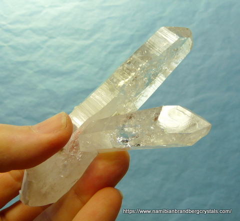 A nice-sized quartz specimen with the main crystal being slightly bent, and some gemmy areas