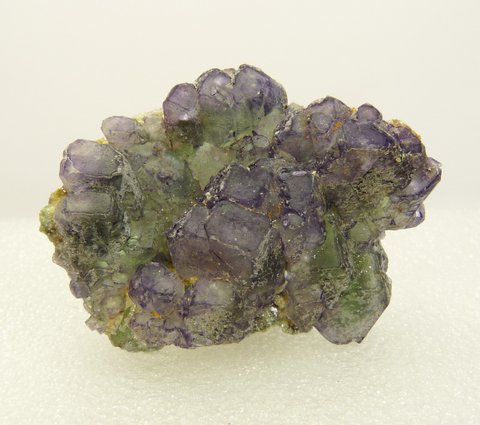 2-sided fluorite crystal group with hyalite opal