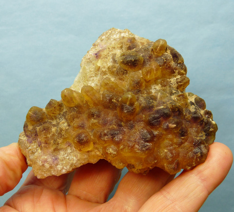 Yellow and purple fluorite crystals on fluorite matrix