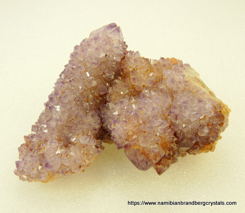 Light amethyst cactus quartz crystals on matrix