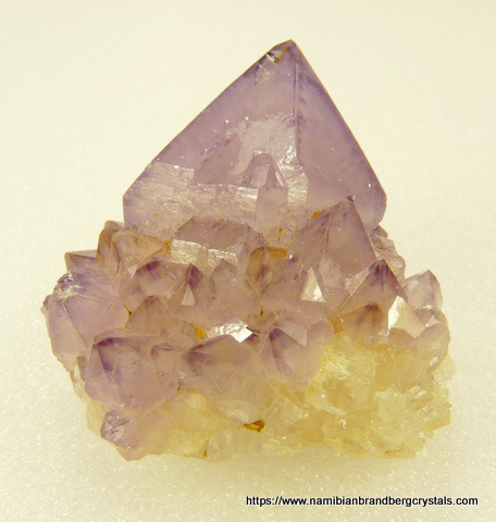 Light amethyst cactus quartz crystal on matrix
