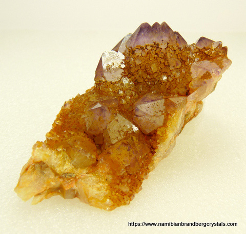 Light amethyst cactus quartz crystals on matrix