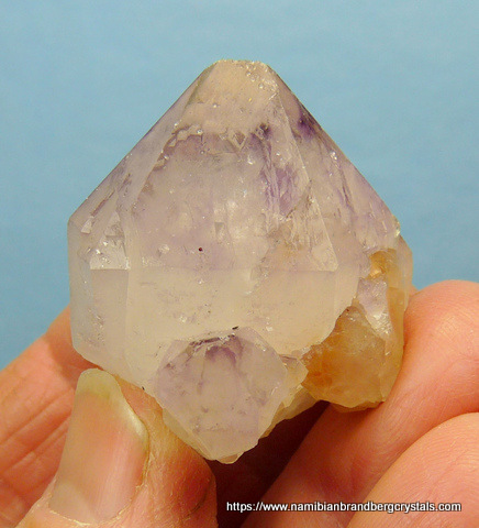 Unusual, stubby quartz specimen with amethyst patches