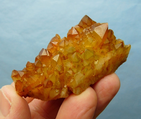 Quartz crystal group with iron oxide