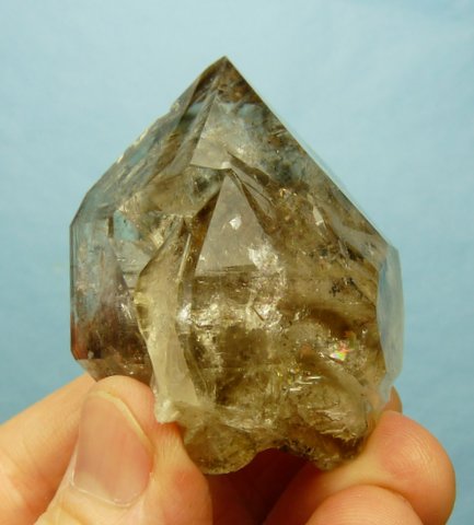 Gemmy quartz crystal with interesting facets and a window