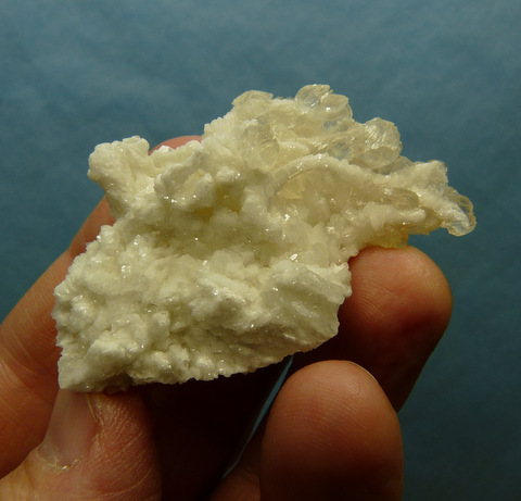 Beautiful crystals of (?)calcite on sparkling white matrix